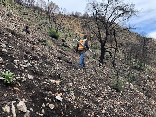 PhD student Parker Blunts collecting Electromagnetic measurements in the Santa Cruz CZU-wildfire affected area. 